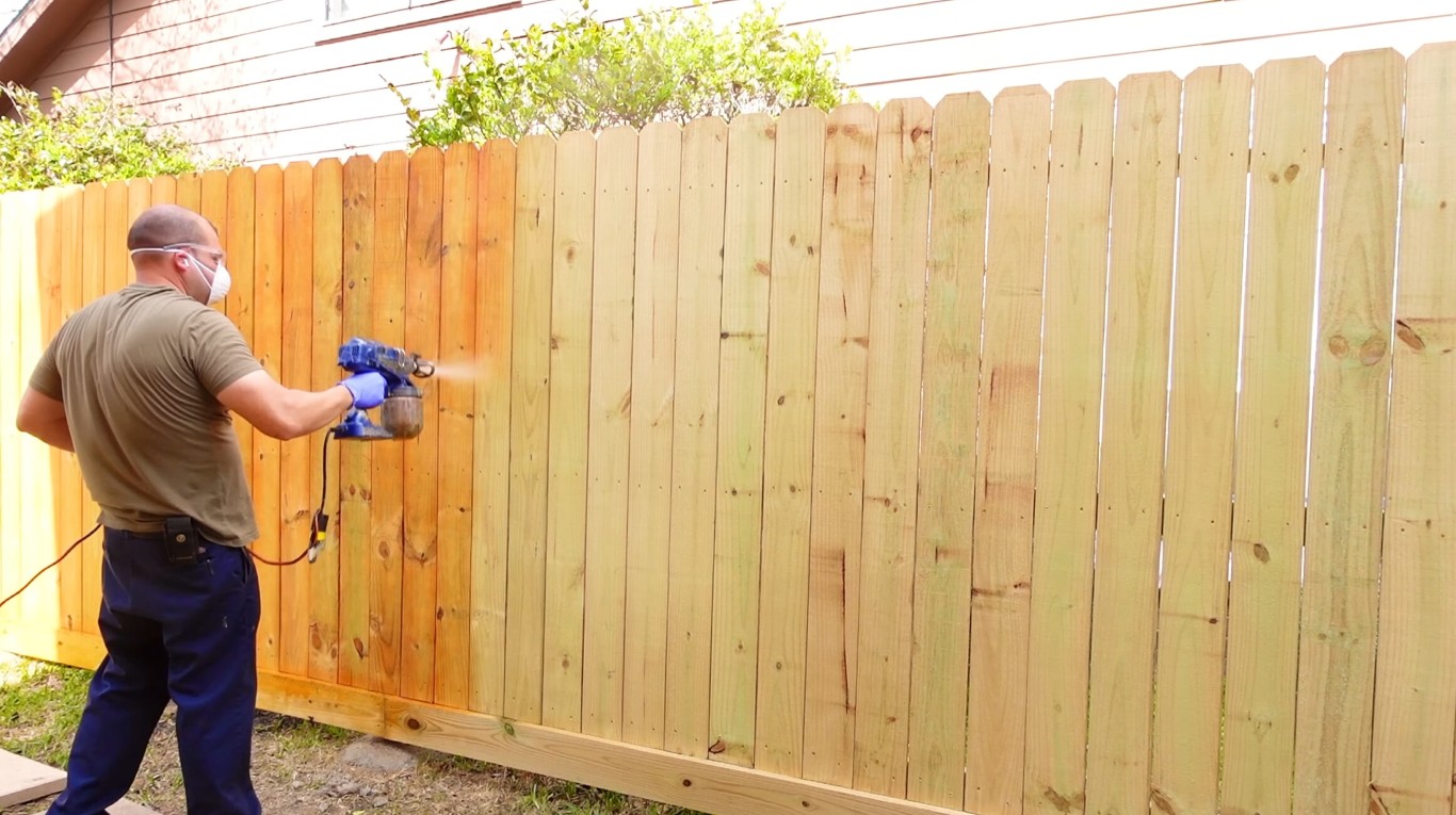 Professional fence repair and staining services in Ivins, UT restoring wood fence durability